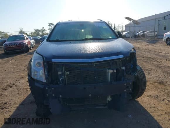 ✅ 2015 Cadillac SRX Luxury Collection • VIN: 3GYFNBE39FS611246 • Lot: 43327440. Listed on IAAI with 113,077 mi. Free auction sales archive from the USA and detailed vehicle history report at DreamBid. Image 13.