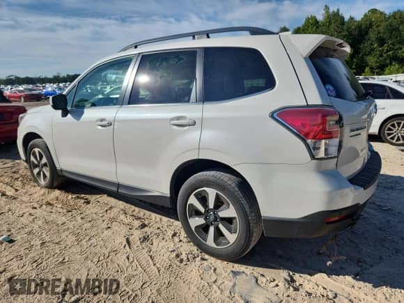 2017 Subaru Forester Limited with VIN JF2SJARCXHH523100, listed as a Copart auction lot 84559495 with 94,988 mi miles and Salvage title. Bid and sale history available at DreamBid. Image 2.