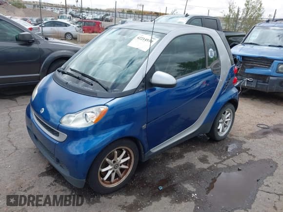 ✅ 2008 Smart fortwo Pure • VIN: WMEEJ31X88K167241 • Lot: 42214530. Listed on IAAI with 75,289 mi. Free auction sales archive from the USA and detailed vehicle history report at DreamBid. Image 2.