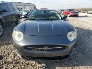 ✅ 2007 Jaguar XK • VIN: SAJDA44B675B02423 • Лот: 77555494. Опубликован ранее на Copart с пробегом 90 250 миль. Бесплатный доступ к архиву аукционных продаж из США и подробный отчёт об истории автомобиля на DreamBid. Изображение 5.