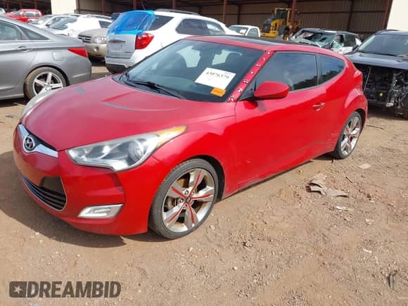 2013 Hyundai Veloster w/Black Int с VIN KMHTC6AD3DU099707, выставлен на аукционе IAAI как лот 43076379 с пробегом 128 517 миль миль и . История ставок и продаж доступна на DreamBid. Изображение 2.