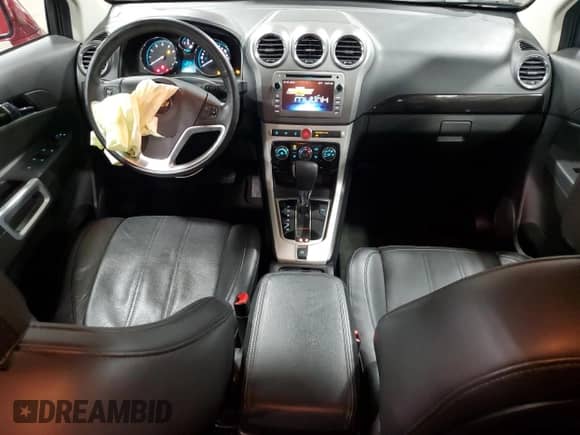 2015 Chevrolet Captiva Sport LTZ с VIN 3GNAL4EK0FS522407, выставлен на аукционе Copart как лот 82233344 с пробегом 67 068 миль миль и Списание • Salvage title. История ставок и продаж доступна на DreamBid. Изображение 8.