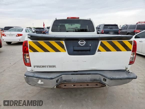 ✅ 2014 Nissan Frontier S • VIN: 1N6BD0CT9EN723341 • Lot: 63628935. Listed on Copart with 166,878 mi. Free auction sales archive from the USA and detailed vehicle history report at DreamBid. Image 6.