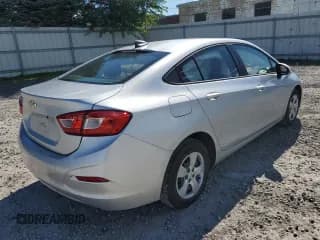 ✅ 2018 Chevrolet Cruze LS • VIN: 1G1BC5SM1J7205440 • Lot: 66359193. Listed on Copart with 15,435 mi. Free auction sales archive from the USA and detailed vehicle history report at DreamBid. Image 3.