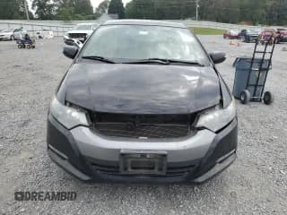 ✅ 2010 Honda Insight EX • VIN: JHMZE2H70AS005614 • Лот: 73456884. Опубликован ранее на Copart с пробегом 122 465 миль. Бесплатный доступ к архиву аукционных продаж из США и подробный отчёт об истории автомобиля на DreamBid. Изображение 5.
