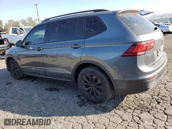 ✅ 2018 Volkswagen Tiguan S • VIN: 3VV1B7AXXJM125428 • Lot: 91265165. Listed on Copart with 94,680 mi. Free auction sales archive from the USA and detailed vehicle history report at DreamBid. Image 2.