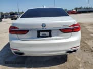 ✅ 2017 BMW 7 Series 740i • VIN: WBA7E2C51HG739932 • Lot: 57101815. Listed on Copart with 58,499 mi. Free auction sales archive from the USA and detailed vehicle history report at DreamBid. Image 6.