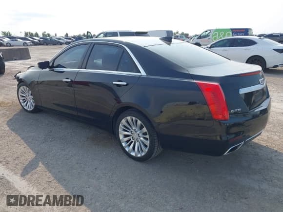 ✅ 2015 Cadillac CTS Luxury RWD • VIN: 1G6AR5SX2F0141438 • Lot: 43004019. Listed on IAAI with 143,885 mi. Free auction sales archive from the USA and detailed vehicle history report at DreamBid. Image 3.