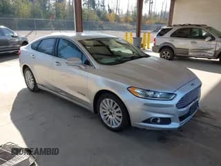 ✅ 2013 Ford Fusion SE Hybrid • VIN: 3FA6P0LU8DR300949 • Lot: 43280751. Wystawiony na IAAI z przebiegiem 159 749 mil. Bezpłatny archiwum sprzedaży aukcyjnych z USA i szczegółowy raport historii pojazdu na DreamBid. Zdjęcie 1.