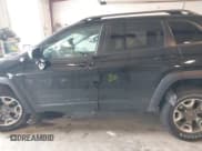 ✅ 2019 Jeep Cherokee Trailhawk • VIN: 1C4PJMBX5KD398170 • Lot: 42387969. Listed on IAAI with 82,396 mi. Free auction sales archive from the USA and detailed vehicle history report at DreamBid. Image 14.