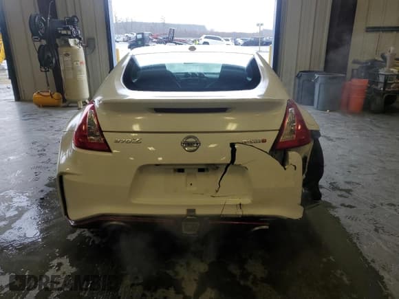 ✅ 2016 Nissan 370Z Nismo • VIN: JN1AZ4EH7GM930385 • Lot: 48208185. Wystawiony na Copart z przebiegiem 66 972 mil. Bezpłatny archiwum sprzedaży aukcyjnych z USA i szczegółowy raport historii pojazdu na DreamBid. Zdjęcie 6.