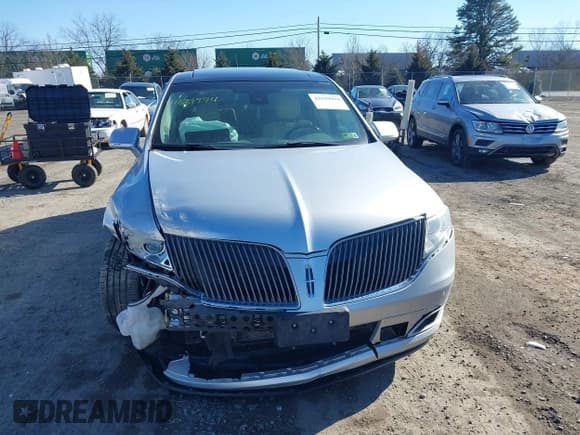 ✅ 2014 Lincoln MKT EcoBoost • VIN: 2LMHJ5AT3EBL54011 • Лот: 41639994. Опубликован ранее на IAAI с пробегом 138 032 миль. Бесплатный доступ к архиву аукционных продаж из США и подробный отчёт об истории автомобиля на DreamBid. Изображение 12.