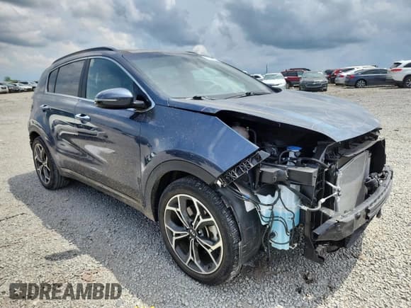 ✅ 2021 Kia Sportage SX Turbo • VIN: KNDPR3A68M7928628 • Lot: 67077955. Listed on Copart with 30,699 mi. Free auction sales archive from the USA and detailed vehicle history report at DreamBid. Image 4.