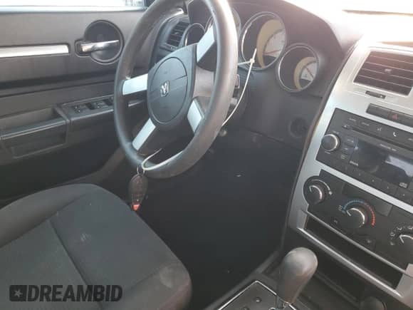 2010 Dodge Charger SXT с VIN 2B3CA3CV8AH274984, выставлен на аукционе Copart как лот 80491134 с пробегом 219 825 миль миль и Списание • Salvage title. История ставок и продаж доступна на DreamBid. Изображение 7.