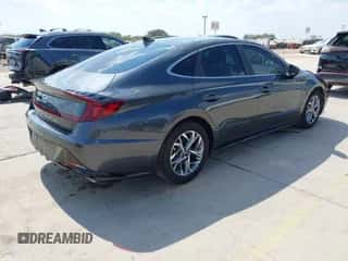 2022 Hyundai Sonata SEL z VIN KMHL64JA5NA229264, wystawiony jako IAAI lot #43219117 z przebiegiem 58 929 mil mil oraz . Historia ofert i sprzedaży dostępna na DreamBid. Obrazek 4.