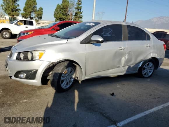 2014 Chevrolet Sonic LT with VIN 1G1JC5SHXE4172203, listed as a Copart auction lot 82361315 with 116,215 mi miles and Salvage title. Bid and sale history available at DreamBid. Image 1.