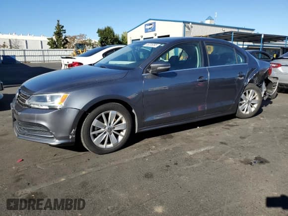 ✅ 2015 Volkswagen Jetta SE • VIN: 3VWD17AJ7FM268058 • Lot: 85205095. Listed on Copart with 64,778 mi. Free auction sales archive from the USA and detailed vehicle history report at DreamBid. Image 1.