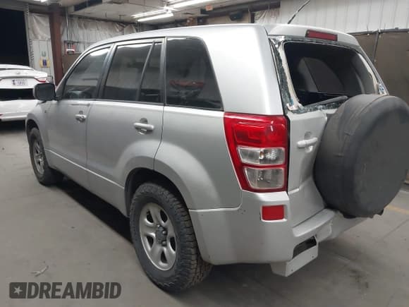 ✅ 2008 Suzuki Grand Vitara w/Spare & Cargo Covers • VIN: JS3TD941X84101254 • Lot: 42043908. Listed on IAAI with 137,180 mi. Free auction sales archive from the USA and detailed vehicle history report at DreamBid. Image 3.