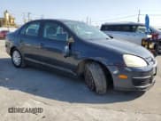 ✅ 2009 Volkswagen Jetta S • VIN: 3VWJZ71K19M009204 • Lot: 59012365. Listed on Copart with 151,711 mi. Free auction sales archive from the USA and detailed vehicle history report at DreamBid. Image 4.