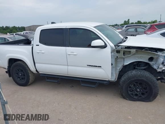✅ 2020 Toyota Tacoma SR5 • VIN: 5TFAZ5CN7LX091469 • Лот: 42850158. Опубликован ранее на IAAI с пробегом 52 254 миль. Бесплатный доступ к архиву аукционных продаж из США и подробный отчёт об истории автомобиля на DreamBid. Изображение 14.