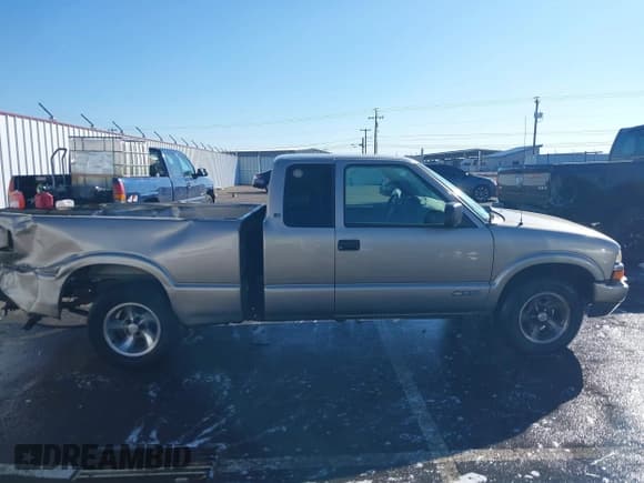✅ 2003 Chevrolet S-10 LS • VIN: 1GCCS19X938207277 • Лот: 41651963. Опубликован ранее на IAAI с пробегом 101 859 миль. Бесплатный доступ к архиву аукционных продаж из США и подробный отчёт об истории автомобиля на DreamBid. Изображение 14.