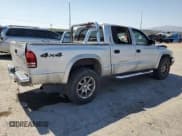 ✅ 2004 Dodge Dakota SLT • VIN: 1D7HG48N74S509797 • Lot: 57797055. Wystawiony na Copart z przebiegiem 214 275 mil. Bezpłatny archiwum sprzedaży aukcyjnych z USA i szczegółowy raport historii pojazdu na DreamBid. Zdjęcie 3.