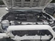 ✅ 2020 Toyota Tacoma TRD Sport • VIN: 3TMAZ5CNXLM139326 • Лот: 84818345. Опубликован ранее на Copart с пробегом 73 667 миль. Бесплатный доступ к архиву аукционных продаж из США и подробный отчёт об истории автомобиля на DreamBid. Изображение 11.