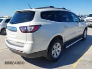 ✅ 2013 Chevrolet Traverse LT • VIN: 1GNKRJKD0DJ146474 • Lot: 43599335. Listed on IAAI with 102,254 mi. Free auction sales archive from the USA and detailed vehicle history report at DreamBid. Image 4.