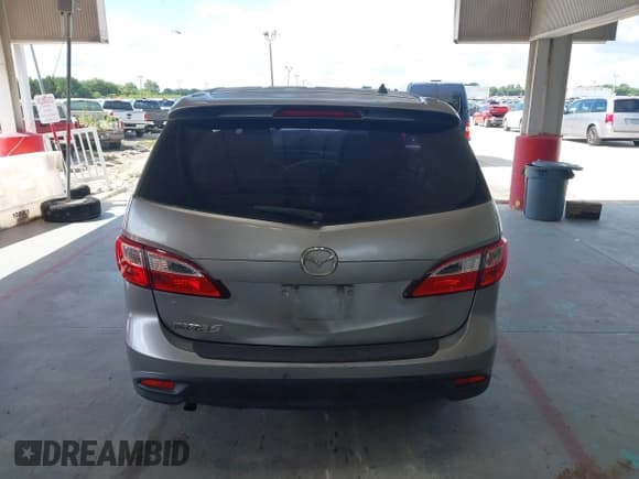 ✅ 2012 Mazda 5 Touring • VIN: JM1CW2CLXC0100950 • Lot: 42648466. Listed on IAAI with 276,752 mi. Free auction sales archive from the USA and detailed vehicle history report at DreamBid. Image 16.