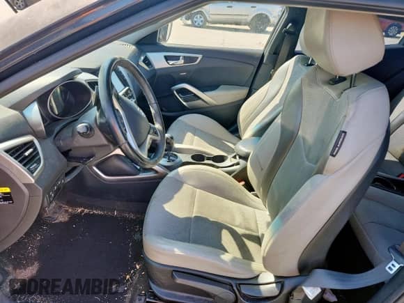 2014 Hyundai Veloster z VIN KMHTC6AD0EU186286, wystawiony jako Copart lot #82402835 z przebiegiem 88 126 mil mil oraz Szkoda całkowita • Salvage title. Historia ofert i sprzedaży dostępna na DreamBid. Obrazek 7.