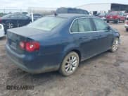 ✅ 2010 Volkswagen Jetta SE • VIN: 3VWRX7AJ9AM008757 • Lot: 42595417. Listed on IAAI with 169,762 mi. Free auction sales archive from the USA and detailed vehicle history report at DreamBid. Image 4.