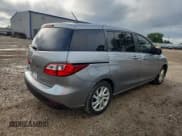 ✅ 2014 Mazda 5 Sport • VIN: JM1CW2BL2E0167207 • Лот: 69662275. Опубликован ранее на Copart с пробегом 150 302 миль. Бесплатный доступ к архиву аукционных продаж из США и подробный отчёт об истории автомобиля на DreamBid. Изображение 3.