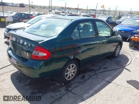 ✅ 2001 Toyota Prius • VIN: JT2BK12UX10033011 • Лот: 42270936. Опубликован ранее на IAAI с пробегом 147 675 миль. Бесплатный доступ к архиву аукционных продаж из США и подробный отчёт об истории автомобиля на DreamBid. Изображение 4.