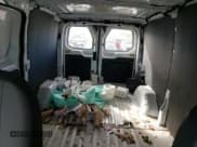 ✅ 2023 Ford Transit Cargo • VIN: 1FTYE1Y82PKA59019 • Lot: 81669074. Wystawiony na Copart z przebiegiem 56 345 mil. Bezpłatny archiwum sprzedaży aukcyjnych z USA i szczegółowy raport historii pojazdu na DreamBid. Zdjęcie 10.