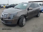 ✅ 2014 Cadillac SRX Luxury Collection • VIN: 3GYFNBE33ES685843 • Lot: 43769310. Wystawiony na IAAI z przebiegiem 145 056 mil. Bezpłatny archiwum sprzedaży aukcyjnych z USA i szczegółowy raport historii pojazdu na DreamBid. Zdjęcie 2.