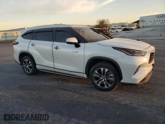✅ 2021 Toyota Highlander Hybrid XLE • VIN: 5TDGARAH4MS010179 • Lot: 93856255. Listed on Copart with Not provided. Free auction sales archive from the USA and detailed vehicle history report at DreamBid. Image 4.