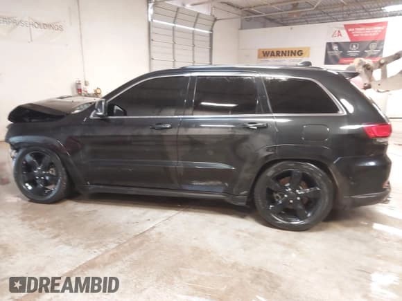 ✅ 2016 Jeep Grand Cherokee Overland • VIN: 1C4RJFCT3GC450537 • Lot: 41556999. Listed on IAAI with 73,753 mi. Free auction sales archive from the USA and detailed vehicle history report at DreamBid. Image 15.