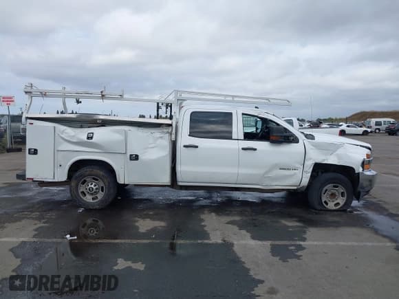 ✅ 2016 Chevrolet Silverado 2500HD Work Truck • VIN: 1GC1CUEG2GF102108 • Lot: 43471361. Listed on IAAI with 185,168 mi. Free auction sales archive from the USA and detailed vehicle history report at DreamBid. Image 13.