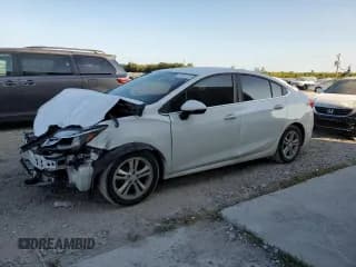 ✅ 2017 Chevrolet Cruze LT • VIN: 1G1BE5SMXH7228784 • Lot: 39724783. Listed on Copart with 80,039 mi. Free auction sales archive from the USA and detailed vehicle history report at DreamBid. Image 1.