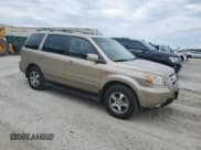 ✅ 2007 Honda Pilot EX-L • VIN: 5FNYF28617B017634 • Лот: 82641705. Опубликован ранее на Copart с пробегом 170 007 миль. Бесплатный доступ к архиву аукционных продаж из США и подробный отчёт об истории автомобиля на DreamBid. Изображение 4.