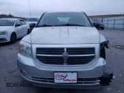 ✅ 2012 Dodge Caliber SXT • VIN: 1C3CDWDA1CD532317 • Лот: 82389814. Опубликован ранее на Copart с пробегом 100 122 миль. Бесплатный доступ к архиву аукционных продаж из США и подробный отчёт об истории автомобиля на DreamBid. Изображение 5.