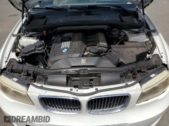 ✅ 2012 BMW 1 Series 128i • VIN: WBAUP7C56CVP23790 • Лот: 71752885. Опубликован ранее на Copart с пробегом 65 195 миль. Бесплатный доступ к архиву аукционных продаж из США и подробный отчёт об истории автомобиля на DreamBid. Изображение 11.