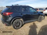 ✅ 2016 Mazda CX-5 Grand Touring • VIN: JM3KE4DY0G0830951 • Lot: 90806115. Wystawiony na Copart z przebiegiem 138 884 mil. Bezpłatny archiwum sprzedaży aukcyjnych z USA i szczegółowy raport historii pojazdu na DreamBid. Zdjęcie 3.