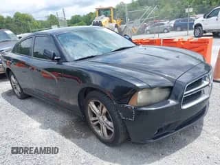 2012 Dodge Charger SXT Plus z VIN 2C3CDXJG3CH183873, wystawiony jako IAAI lot #42768967 z przebiegiem 257 873 mil mil oraz . Historia ofert i sprzedaży dostępna na DreamBid. Obrazek 1.