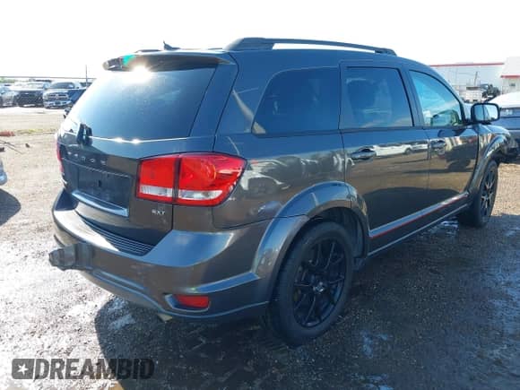 2015 Dodge Journey SXT z VIN 3C4PDCBB5FT747513, wystawiony jako IAAI lot #43192573 z przebiegiem 108 641 mil mil oraz . Historia ofert i sprzedaży dostępna na DreamBid. Obrazek 4.