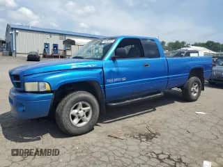 2000 Dodge 1500 with VIN 1B7HF13Z3YJ115182, listed as a Copart auction lot 64382325 with 73,590 mi miles and Salvage title. Bid and sale history available at DreamBid. Image 1.