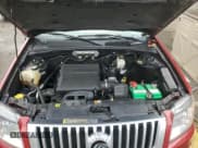 ✅ 2010 Mercury Mariner • VIN: 4M2CN9BG7AKJ23405 • Lot: 84254994. Listed on Copart with 71,705 mi. Free auction sales archive from the USA and detailed vehicle history report at DreamBid. Image 12.