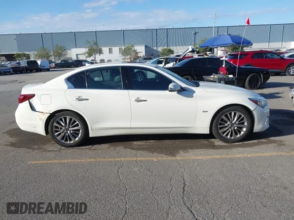 ✅ 2019 Infiniti Q50 Luxe • VIN: JN1EV7AP8KM519758 • Lot: 43408442. Listed on IAAI with 94,434 mi. Free auction sales archive from the USA and detailed vehicle history report at DreamBid. Image 12.
