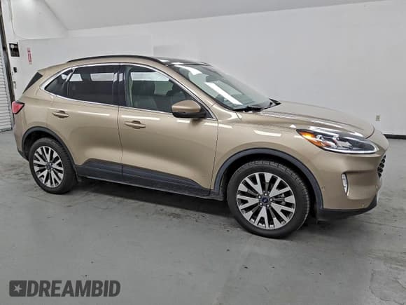 ✅ 2020 Ford Escape Titanium • VIN: 1FMCU9J96LUC77814 • Lot: 91740505. Listed on Copart with 112,914 mi. Free auction sales archive from the USA and detailed vehicle history report at DreamBid. Image 4.