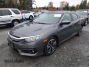 ✅ 2018 Honda Civic EX-L • VIN: 2HGFC1F74JH640836 • Lot: 43597247. Listed on IAAI with 76,137 mi. Free auction sales archive from the USA and detailed vehicle history report at DreamBid. Image 2.